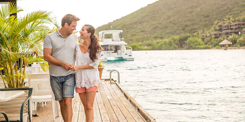 Couple walking dockside