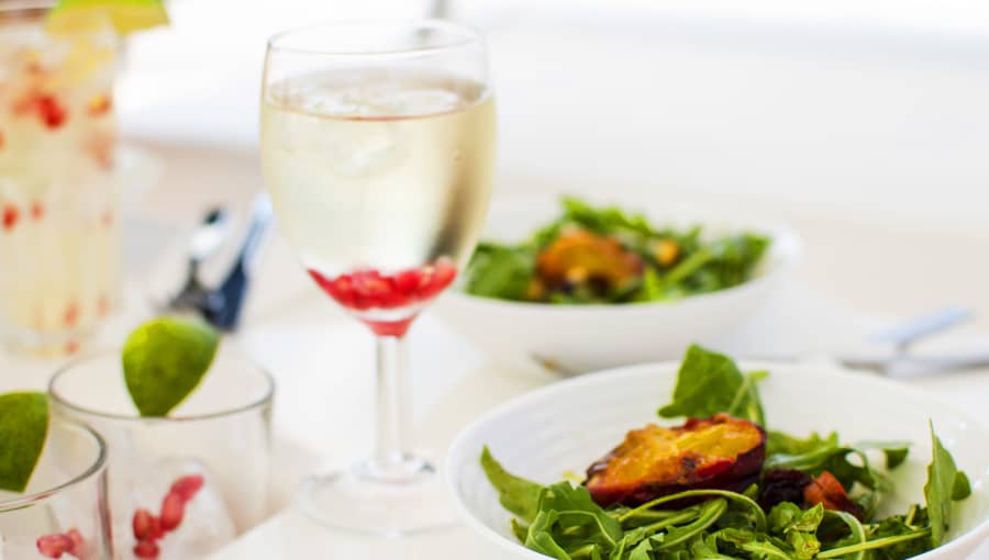 Salad and wine served in Croatia