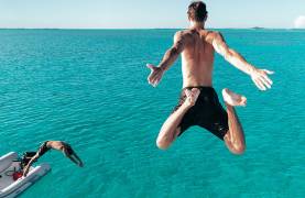 Jumping in water in the Exumas