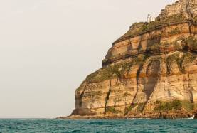 Rocky boulders in sea